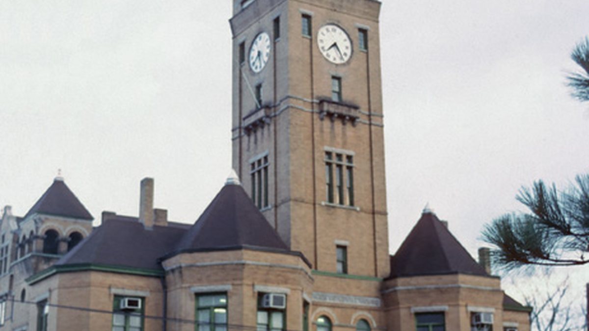 Educational briefing on the Office of the Sheriff for Macon County, Alabama — Tuskegee. Not Macon, Georgia. Not Tuscaloosa. — educational cover (regional illustration)