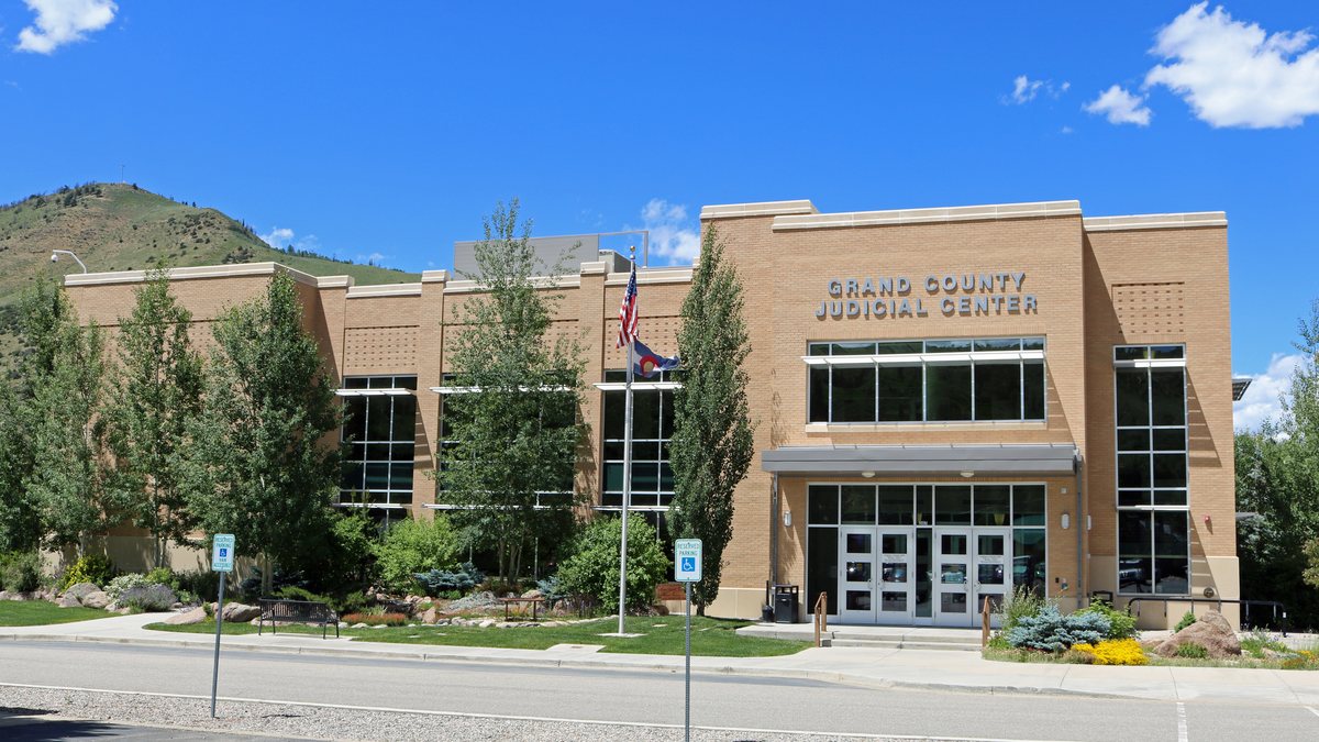 Educational briefing on the Office of the Sheriff for Grand County, Colorado — Hot Sulphur Springs. — educational cover (regional illustration)