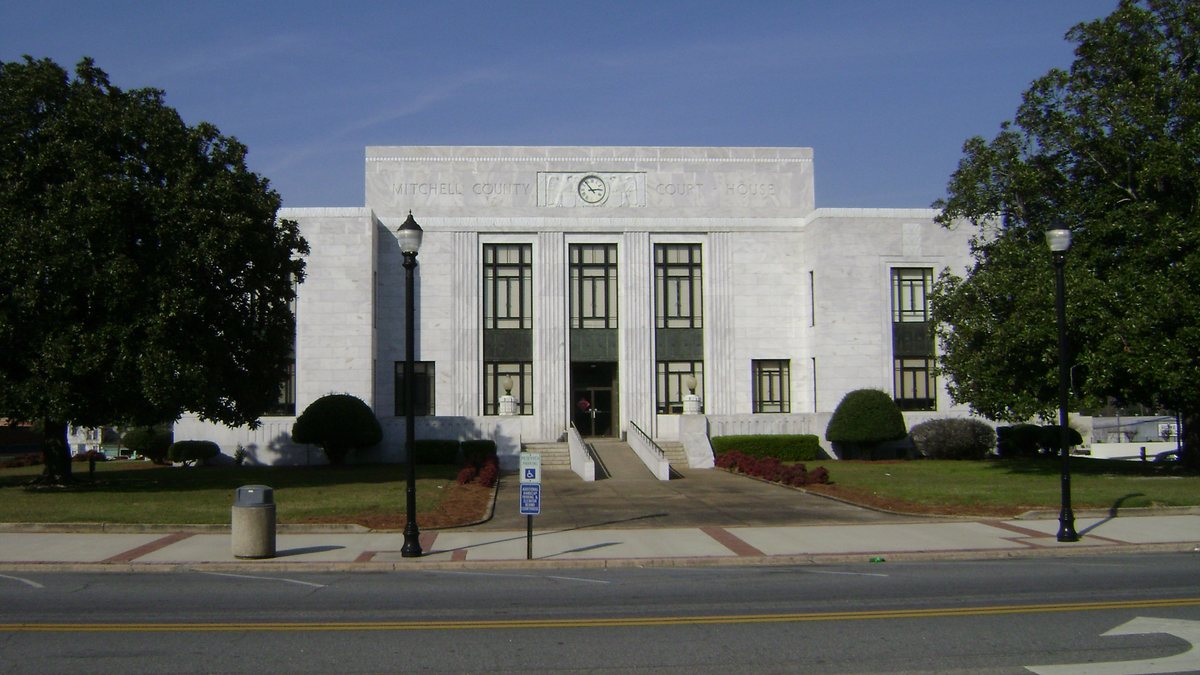 Educational briefing on the Office of the Sheriff for Mitchell County, Georgia — Camilla. — educational cover (regional illustration)