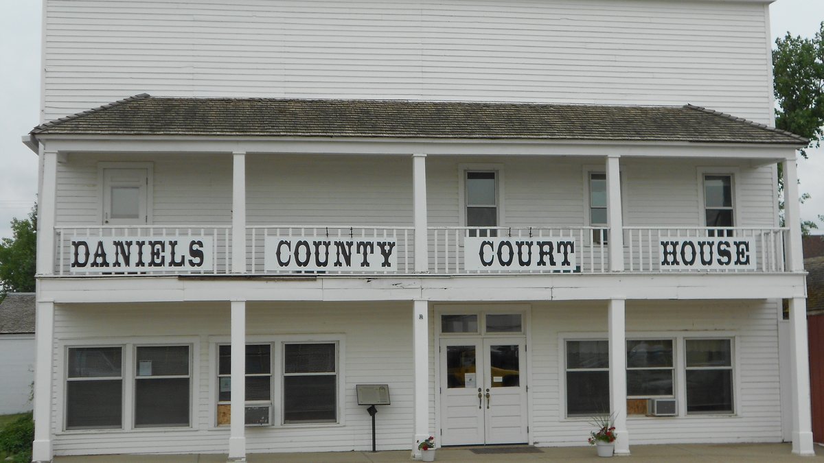 Educational briefing on the Office of the Sheriff for Daniels County, Montana — Scobey. — educational cover (regional illustration)