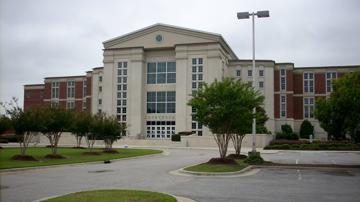 Educational briefing on the Office of the Sheriff for Harnett County, North Carolina — Lillington; its largest community is Anderson Creek. — educational cover (regional illustration)
