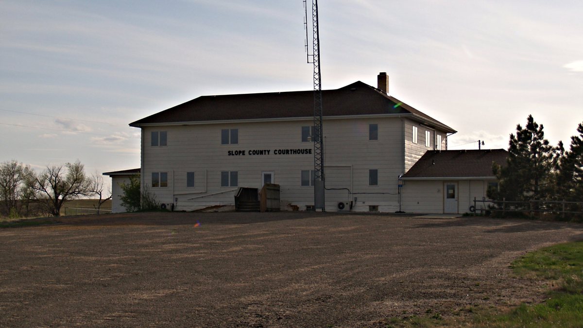Educational briefing on the Office of the Sheriff for Slope County, North Dakota — Amidon and the largest city is Marmarth. — educational cover (regional illustration)