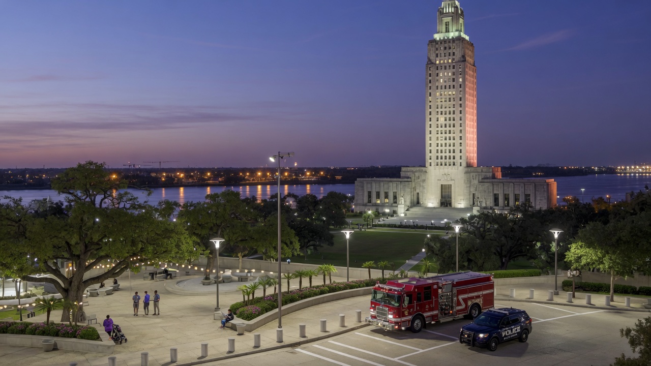 Capitol-and-river civic plaza — educational cover (city-run action, American Future Type)