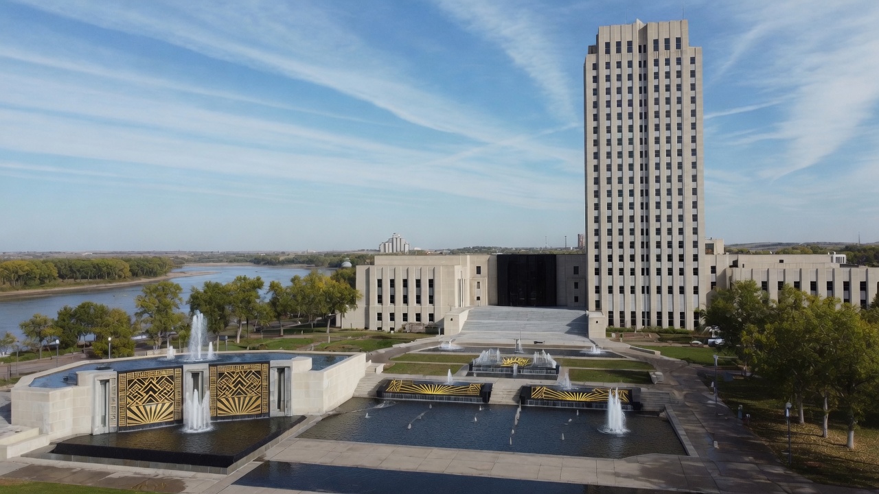 Bismarck 19-story Capitol, Missouri River, and civic fountains — educational cover (Greek Orthodoxy civic grammar, American Future Type)